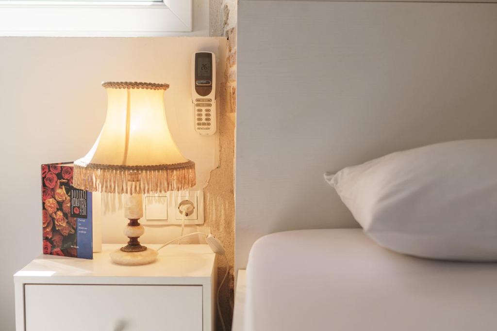 Кровать или кровати в номере Šibenik Style Suites