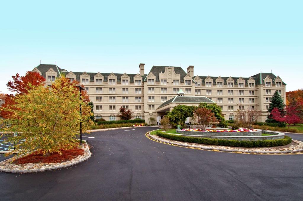 a large building with a road in front of it at Hilton Pearl River in Pearl River