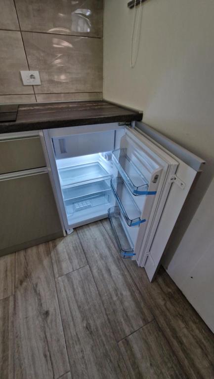 Kuchyň nebo kuchyňský kout v ubytování Apartmani Klačar
