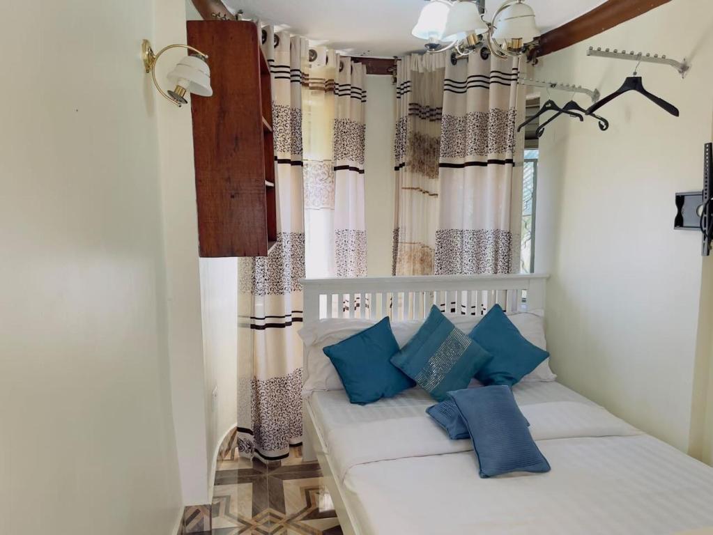 Albert Suites & Apartments Entebbe - Casa De Una Habitación
