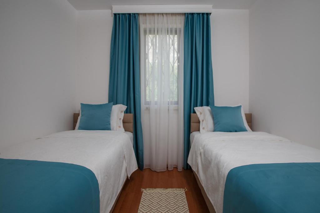 Postel nebo postele na pokoji v ubytování Villa Palma