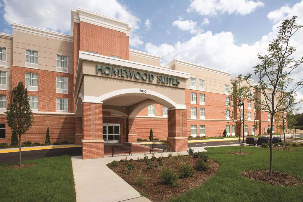 a building with a sign that reads honeywood suites at Homewood Suites by Hilton - Charlottesville in Charlottesville