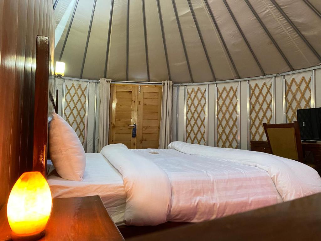 Postel nebo postele na pokoji v ubytování Apex Hotels and Resorts Hussaini