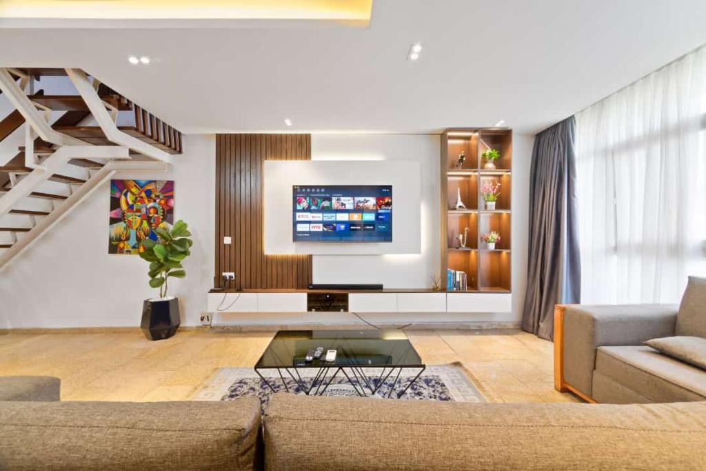 TV a/nebo společenská místnost v ubytování OlliebeierArtApartment Charming recently refurbished three-bedroom apartment located in VI