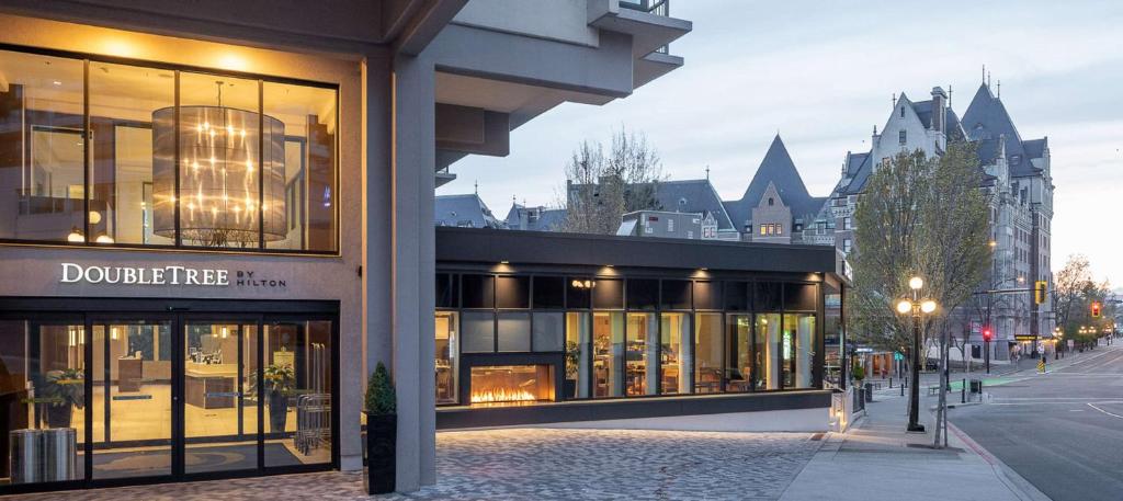 a store on a city street with a building at DoubleTree by Hilton Hotel & Suites Victoria in Victoria