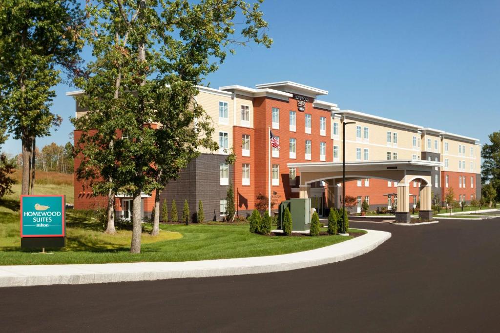 a rendering of the entrance to a building at Homewood Suites by Hilton Gateway Hills Nashua in Nashua