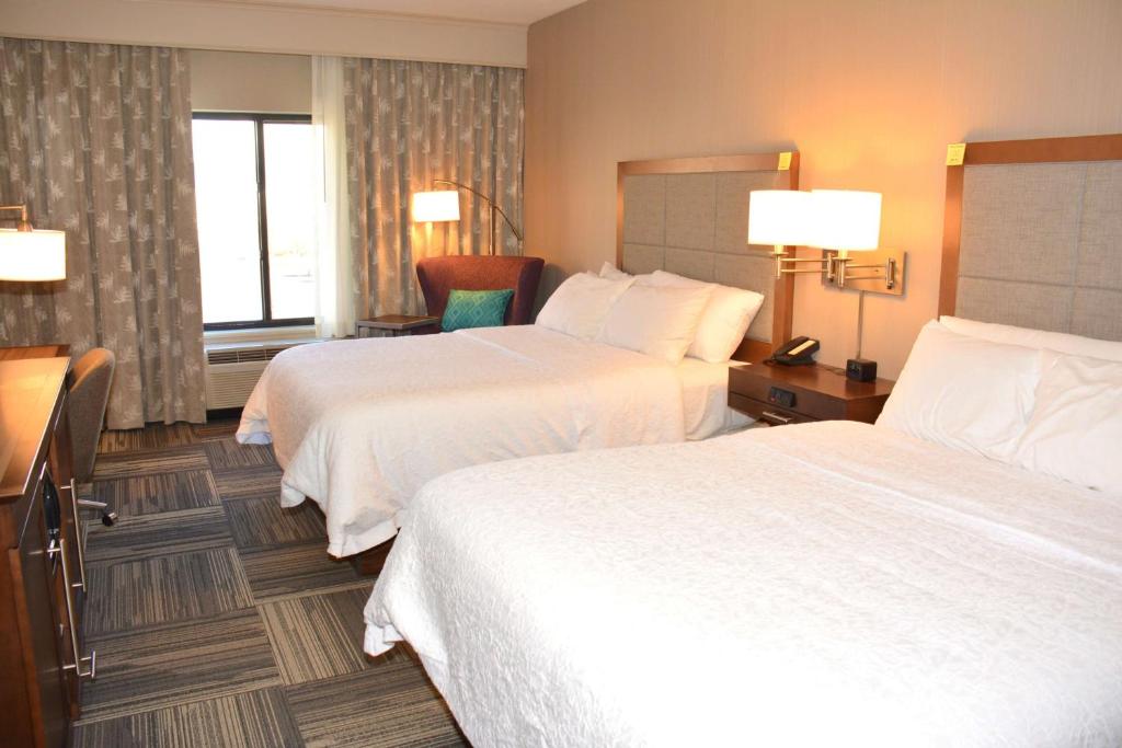 Postel nebo postele na pokoji v ubytování Hampton Inn Grand Junction