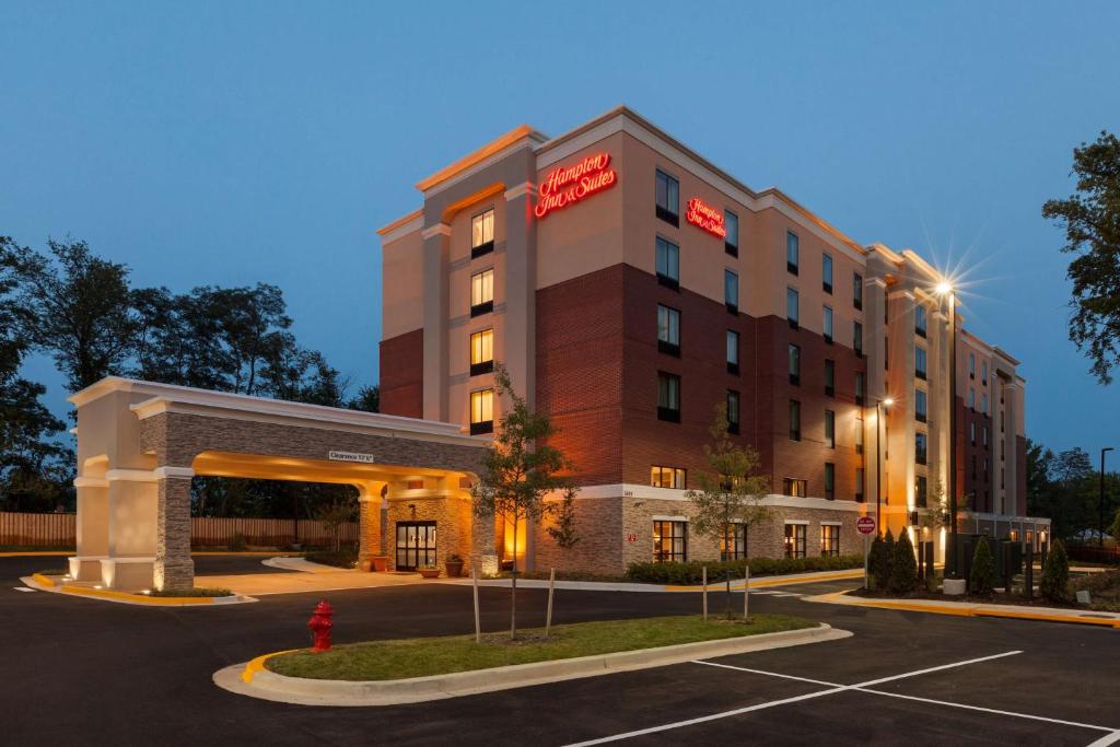 a rendering of a hotel with a parking lot at Hampton Inn and Suites Camp Springs in Camp Springs