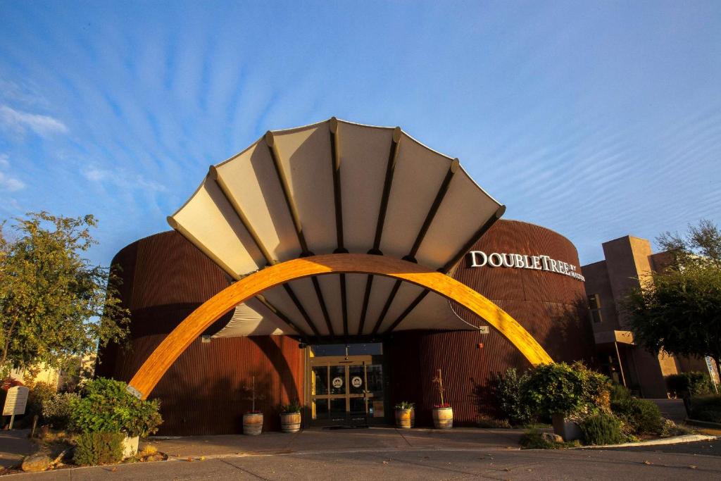 a building with an arch in front of it at DoubleTree by Hilton Napa Valley - American Canyon in American Canyon