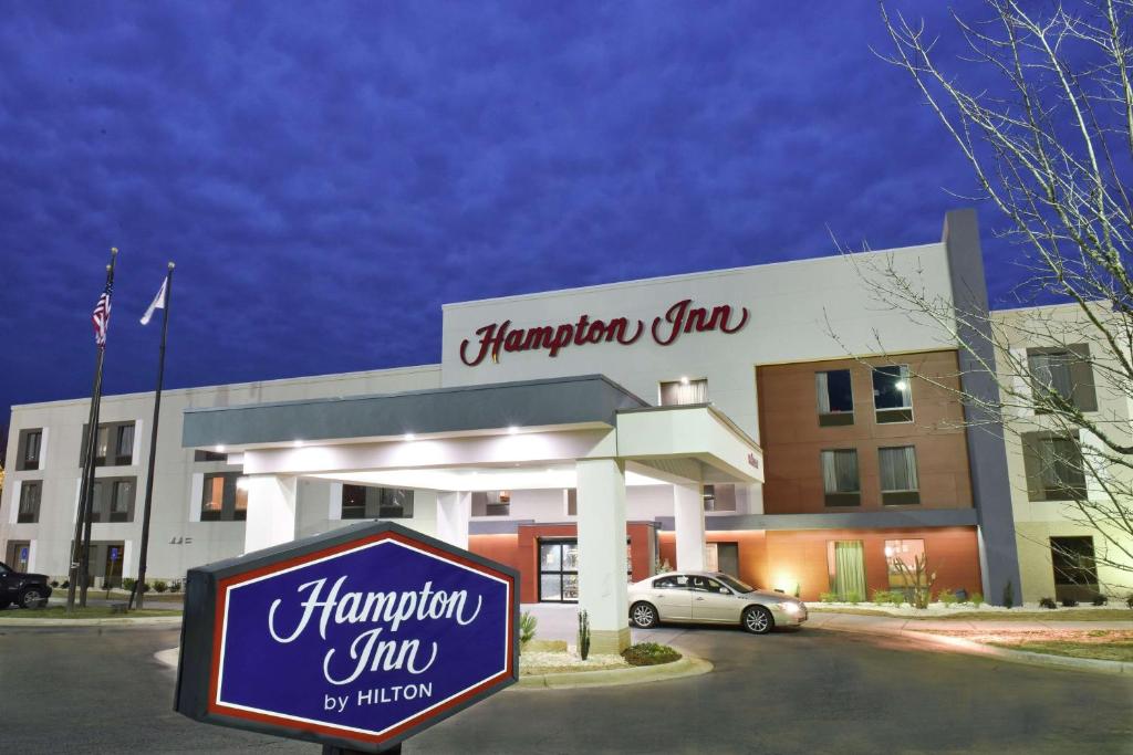 a sign in front of a hampton inn at Hampton Inn Madison in Madison