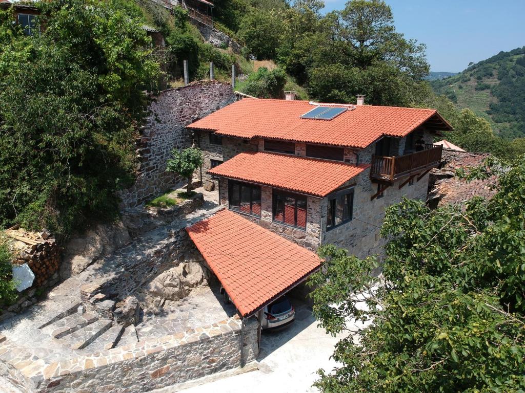 an aerial view of a house with an orange roof at Casa Yañez in Chantada