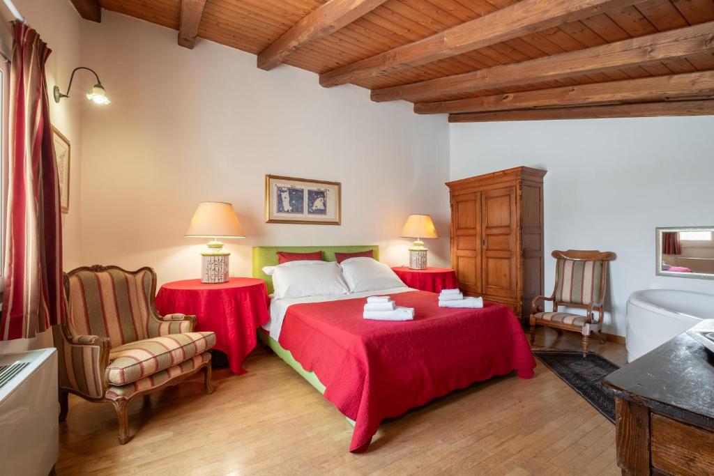 Cama o camas de una habitación en Corte Cristina & Suites
