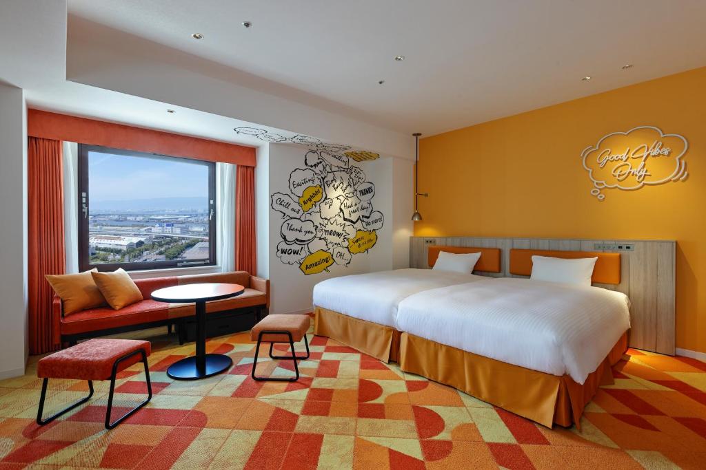 Postel nebo postele na pokoji v ubytování Hotel Kintetsu Universal City