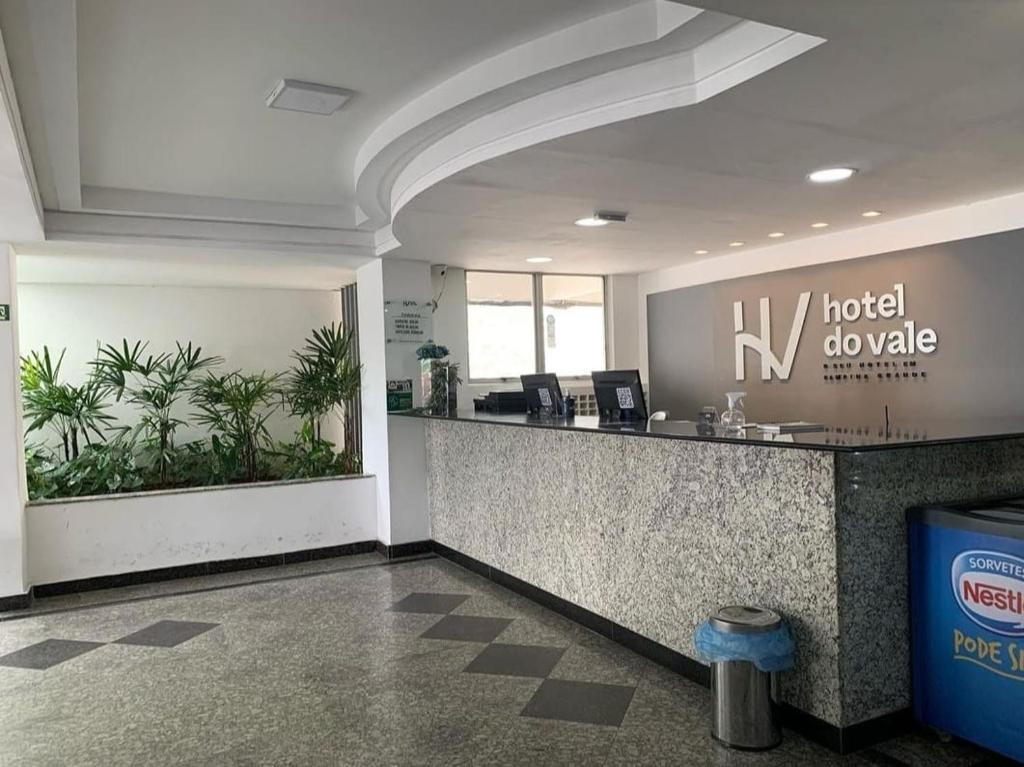 an office with a lobby with a hotel do wake counter at Hotel do Vale in Campina Grande