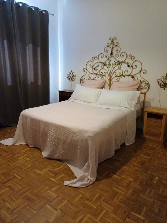 Postel nebo postele na pokoji v ubytování Villamonestevole501