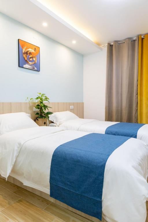 Postel nebo postele na pokoji v ubytování home in superior如家