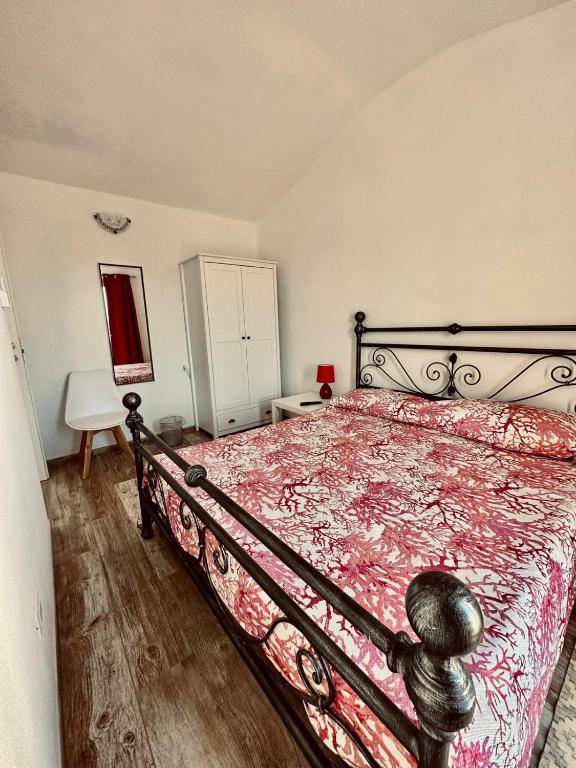 Postel nebo postele na pokoji v ubytování B&B Luchia