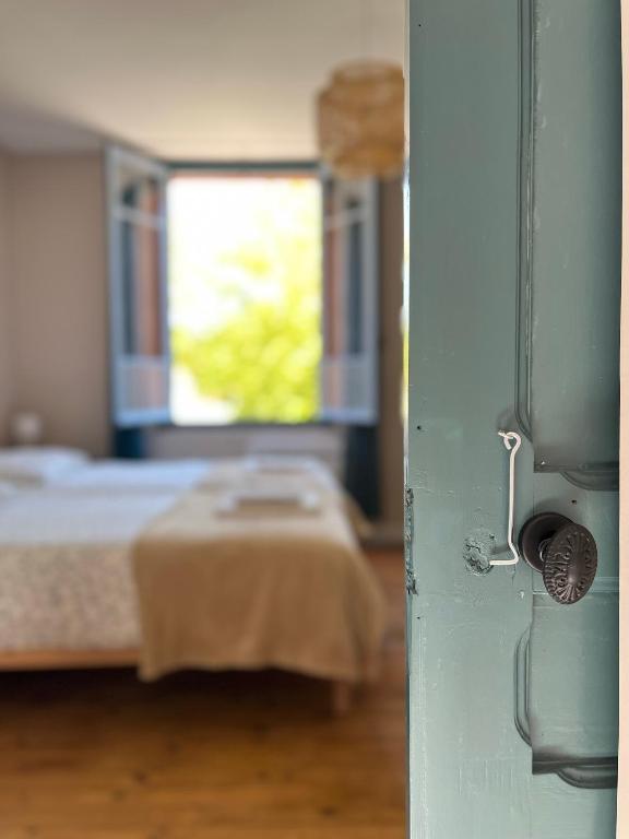 Postel nebo postele na pokoji v ubytování Le gîte du port canal