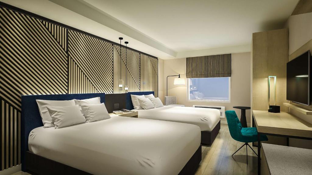 
Queen Room with Two Queen Beds and Mobility Accessible Tub
