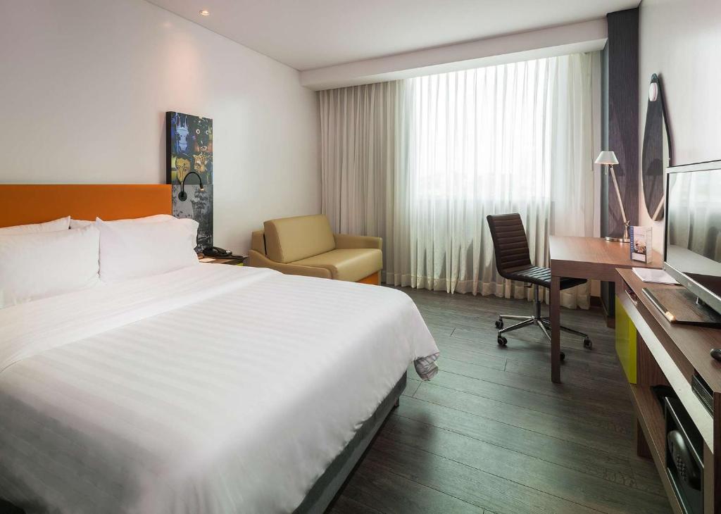Postel nebo postele na pokoji v ubytování Hampton by Hilton Barranquilla
