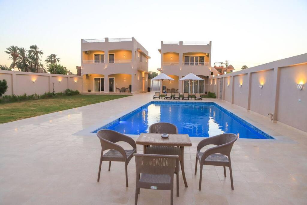 Πισίνα στο ή κοντά στο Royal Nile Villa - Nile View Apartment 1