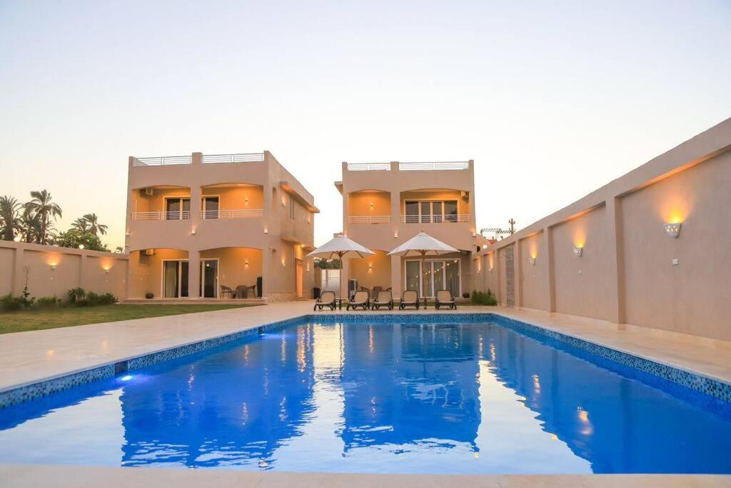 Πισίνα στο ή κοντά στο Royal Nile Villa - Nile View Apartment 1