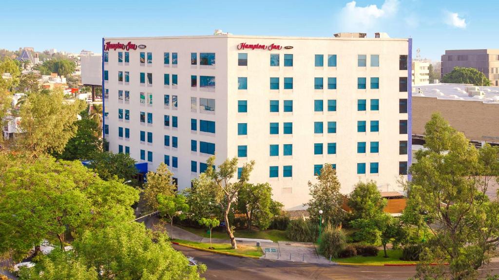 an aerial view of a white building at Hampton by Hilton Guadalajara Expo in Guadalajara