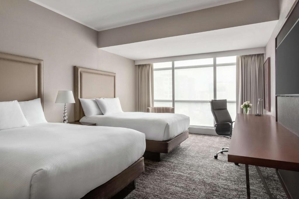Voodi või voodid majutusasutuse DoubleTree by Hilton Lima Miraflores El Pardo toas