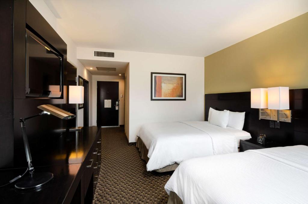 Postel nebo postele na pokoji v ubytování DoubleTree by Hilton Queretaro