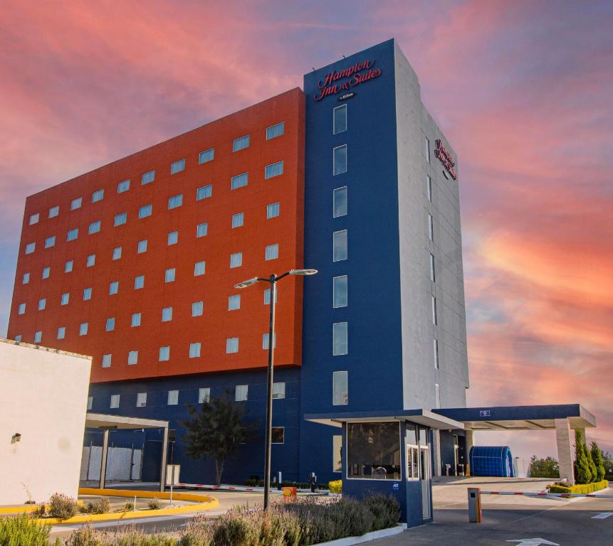 a rendering of a hotel with a building at Hampton Inn & Suites by Hilton Salamanca Bajio in Salamanca