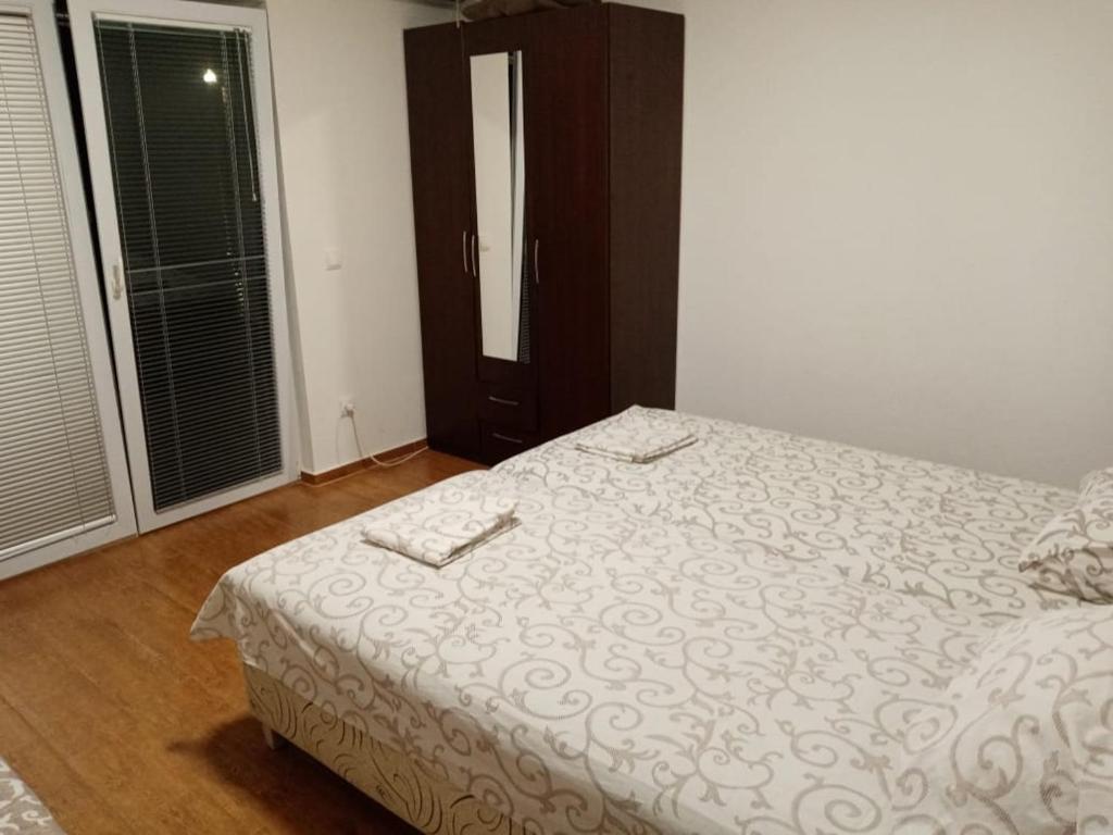 Postel nebo postele na pokoji v ubytování Malina apartman