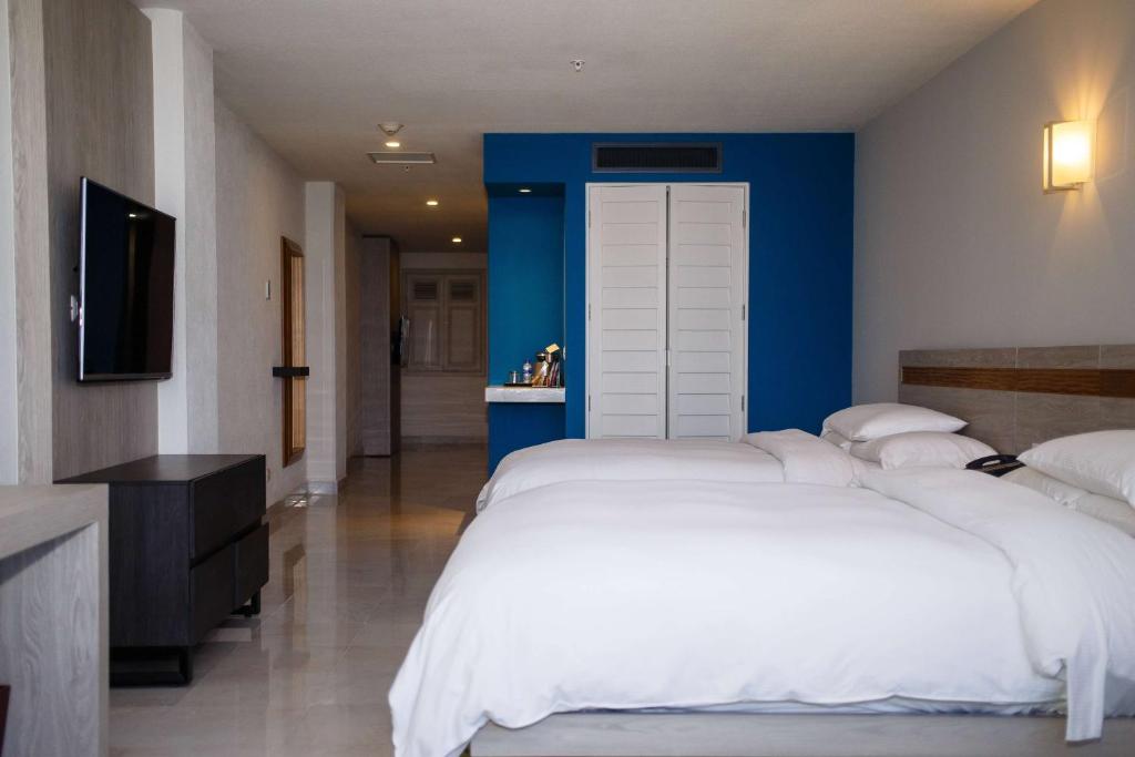 Postel nebo postele na pokoji v ubytování DoubleTree by Hilton Veracruz