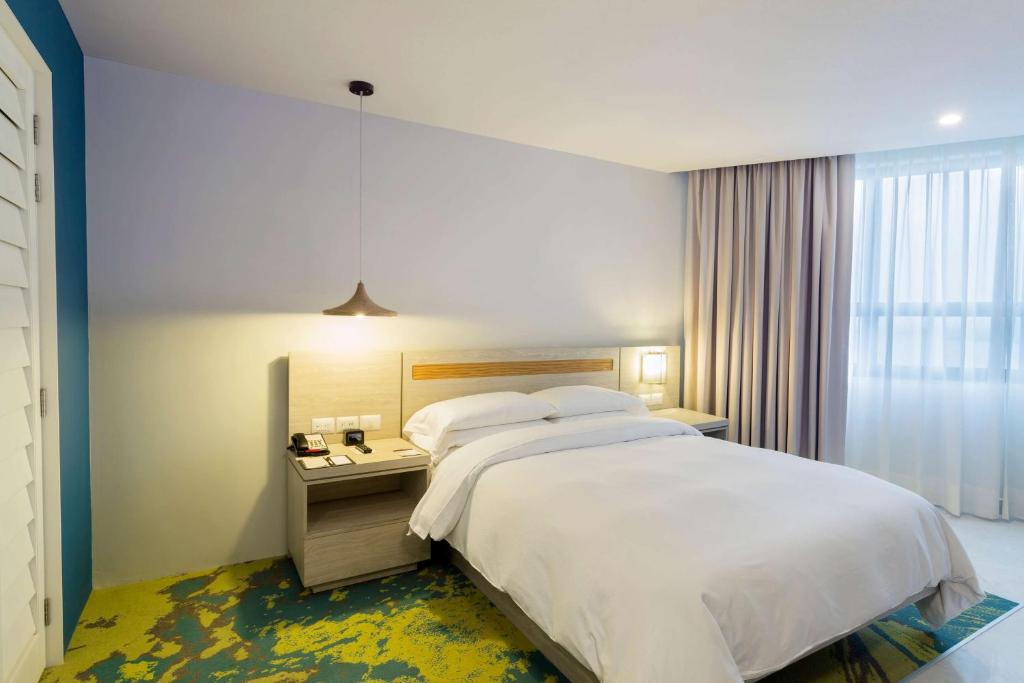 Postel nebo postele na pokoji v ubytování DoubleTree by Hilton Veracruz