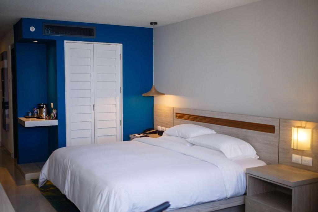 Postel nebo postele na pokoji v ubytování DoubleTree by Hilton Veracruz