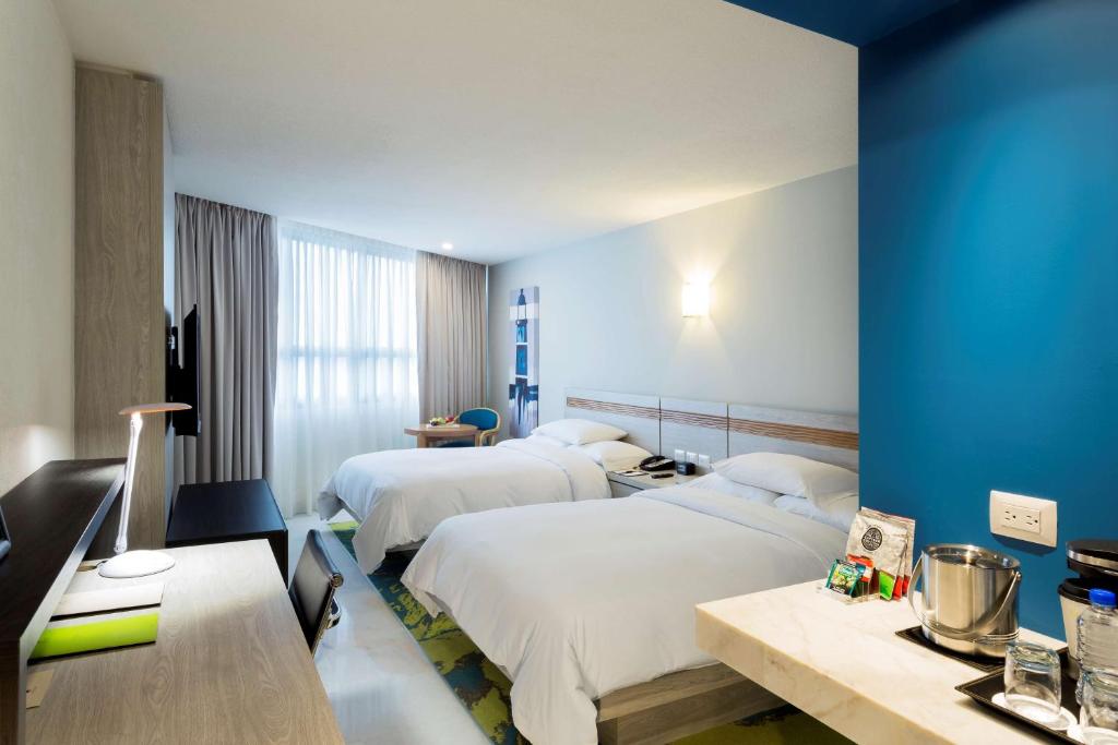 Postel nebo postele na pokoji v ubytování DoubleTree by Hilton Veracruz