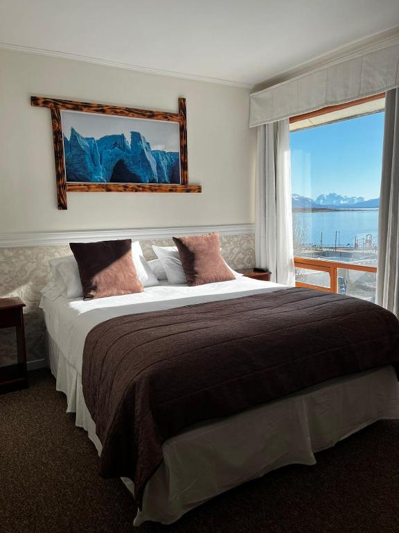 Postel nebo postele na pokoji v ubytování Darwin Hotel