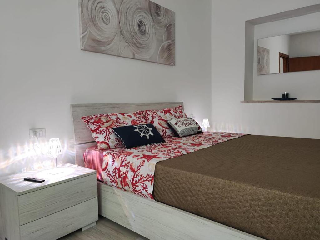 Postel nebo postele na pokoji v ubytování L'uliveto sui Trabocchi