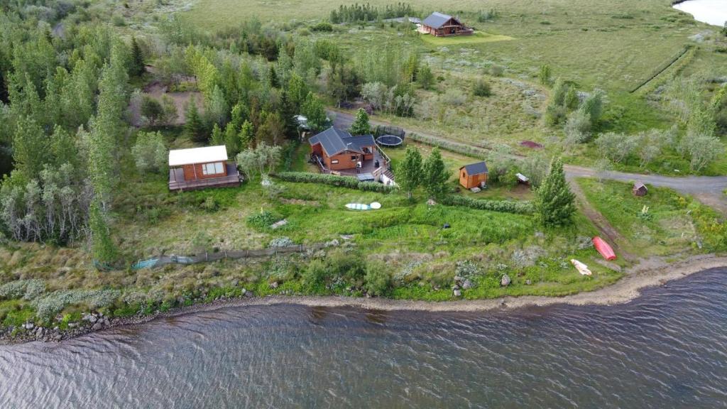 an aerial view of a house on an island in the water at Near Golden Circle-10 sleeps in Selfoss