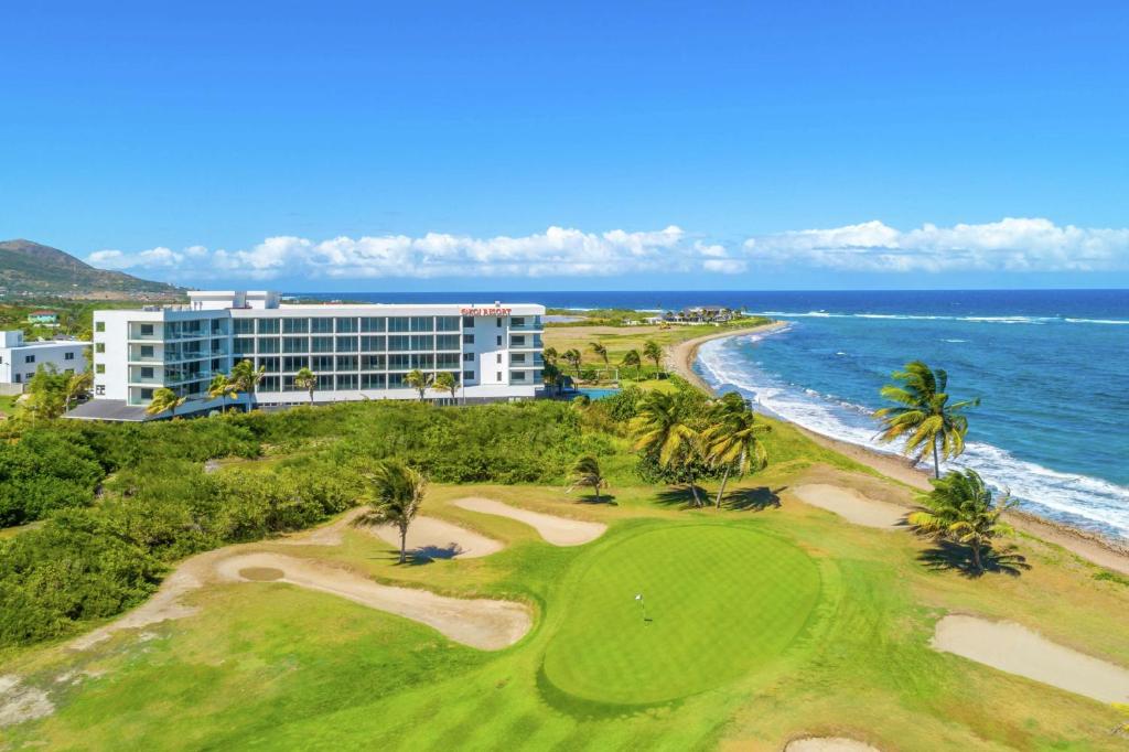 an aerial view of a hotel and the ocean at Koi Resort Saint Kitts, Curio Collection by Hilton in Basseterre