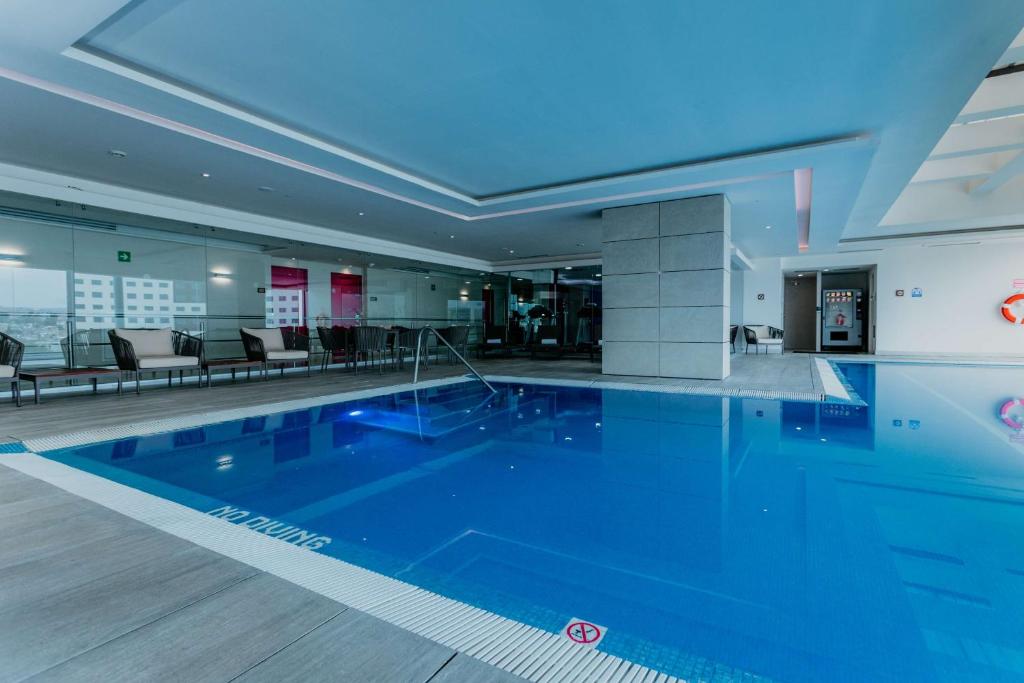 Bazén v ubytování Hilton Garden Inn Silao Aeropuerto Bajio nebo v jeho okolí