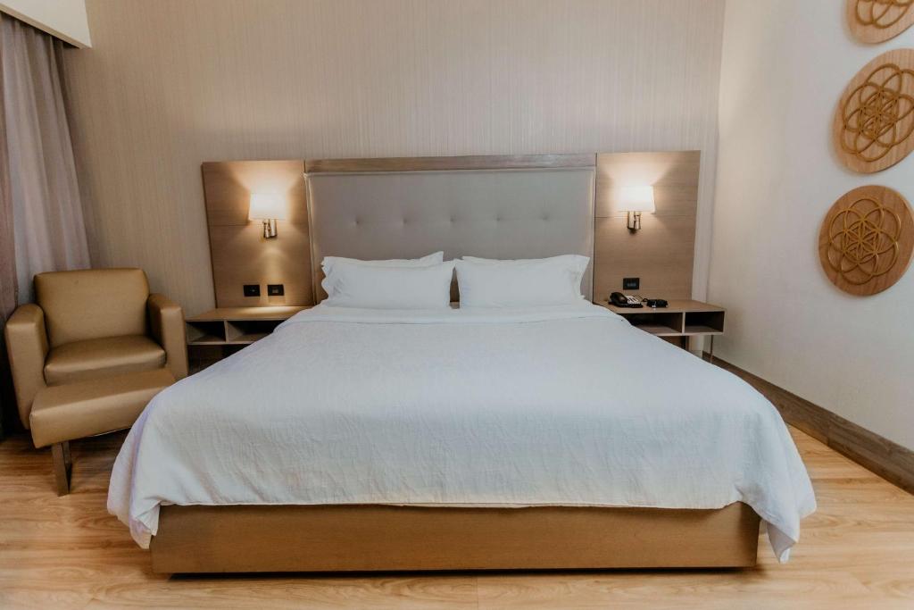 Postel nebo postele na pokoji v ubytování Hilton Garden Inn Silao Aeropuerto Bajio