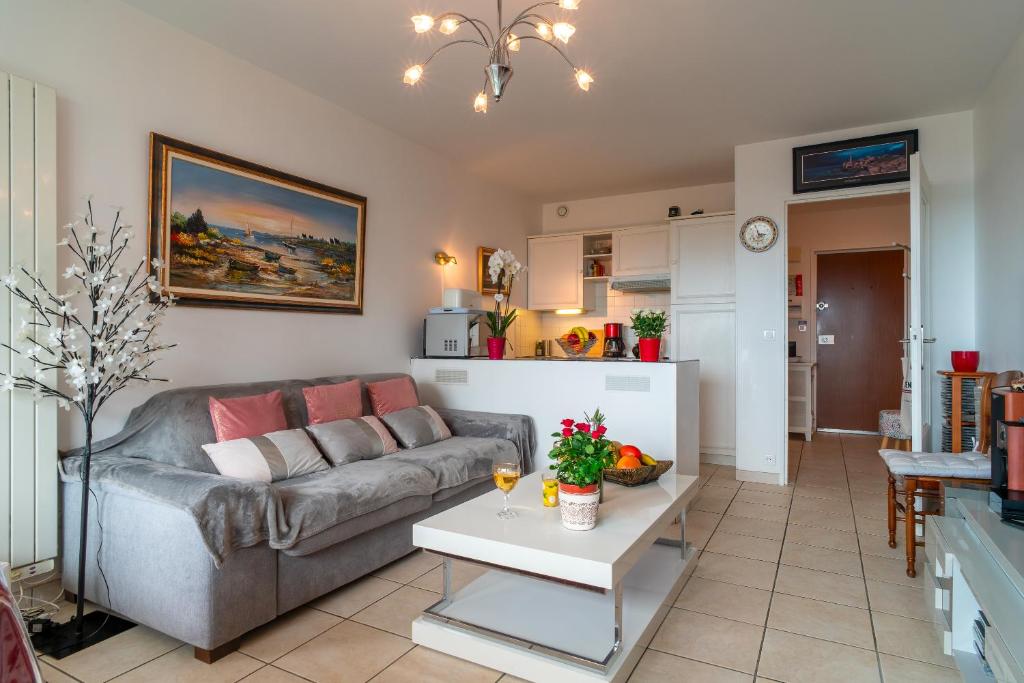 Posezení v ubytování Appartement à Bénodet 3 étoiles avec vue sur mer