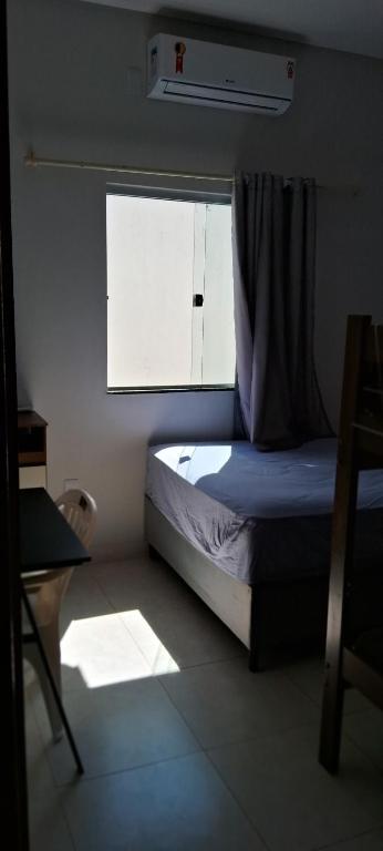 Postel nebo postele na pokoji v ubytování Casa com piscina e espaço gourmet a 30m da praia!