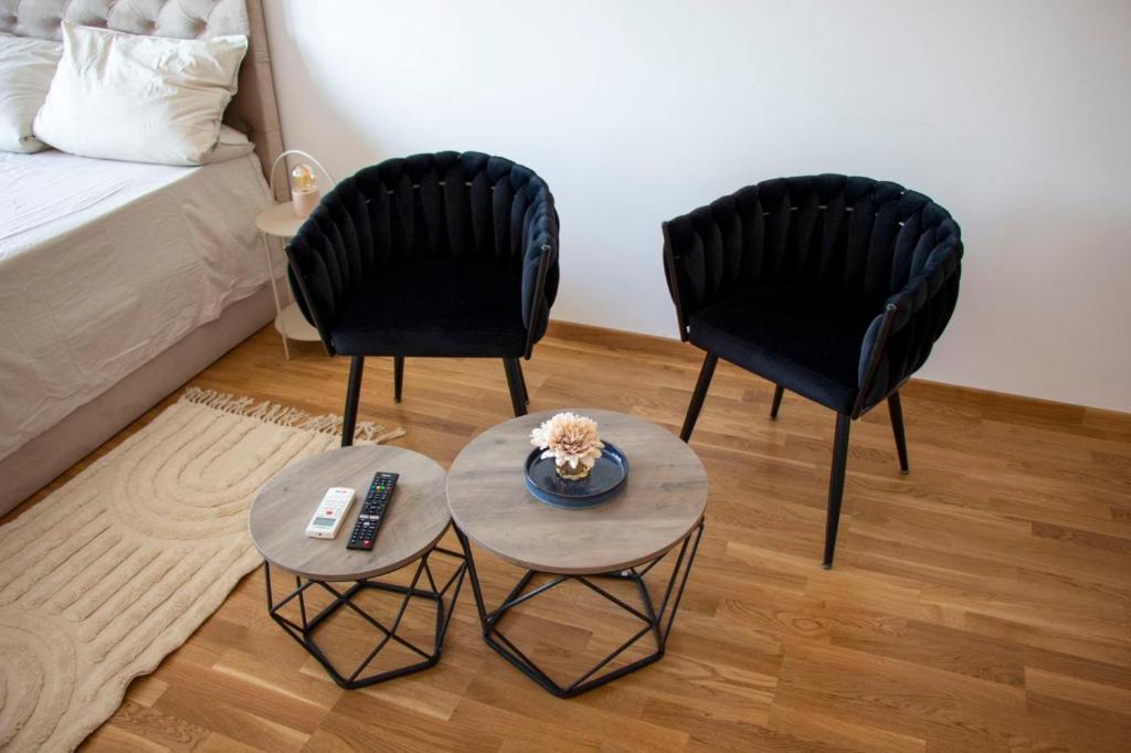 Postel nebo postele na pokoji v ubytování Harmony Studio Apartment