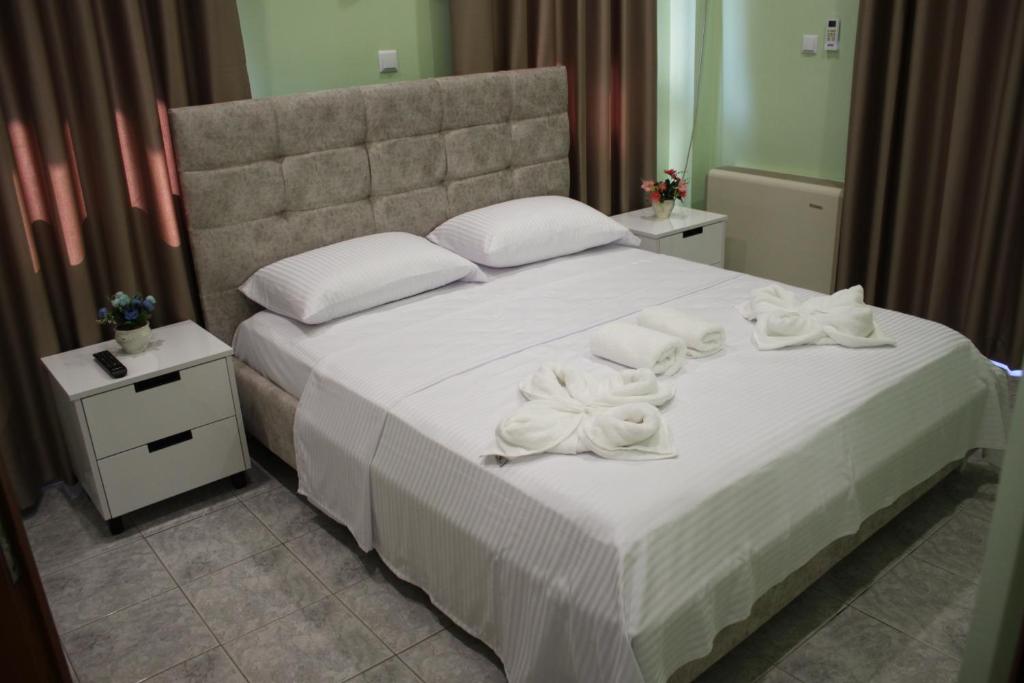 Postel nebo postele na pokoji v ubytování Hotel Mondo