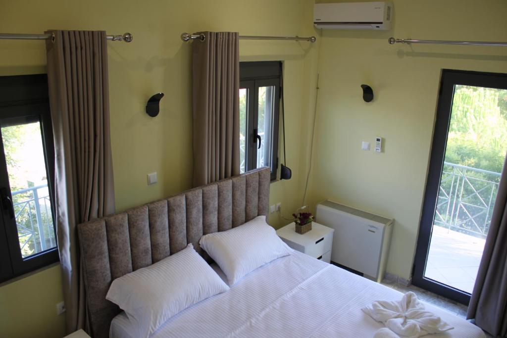 Postel nebo postele na pokoji v ubytování Hotel Mondo