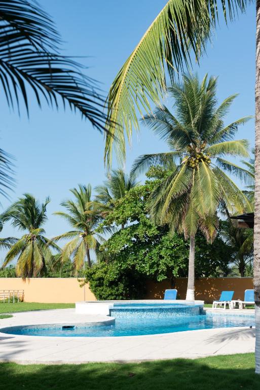 Bazén v ubytování Hotel Cayman Suites nebo v jeho okolí