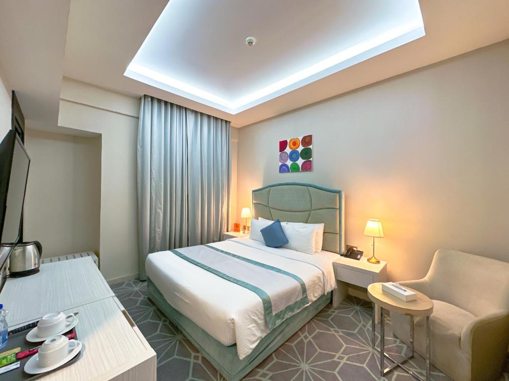 Kama o mga kama sa kuwarto sa The Victory Hotel