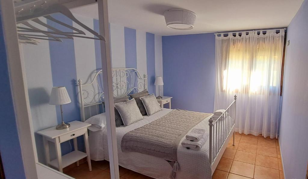 Posteľ alebo postele v izbe v ubytovaní Casa Ferbi