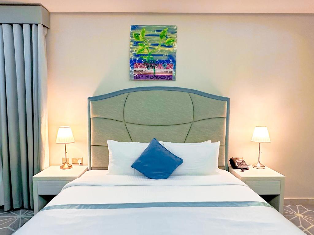 Kama o mga kama sa kuwarto sa The Victory Hotel